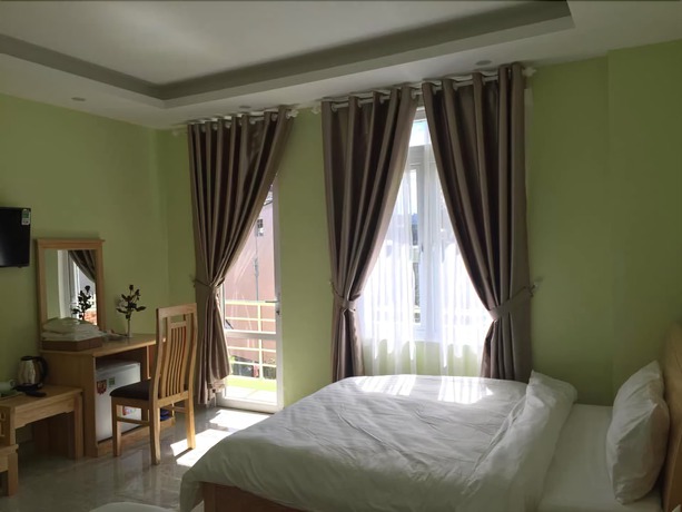 Imagen de la habitación del Hotel Trung Nhan. Foto 16