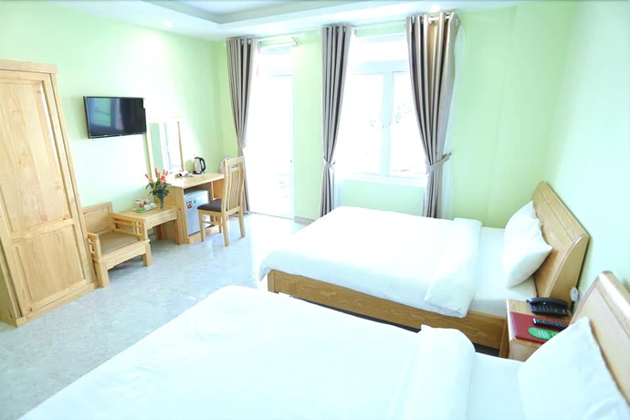 Imagen de la habitación del Hotel Trung Nhan. Foto 17