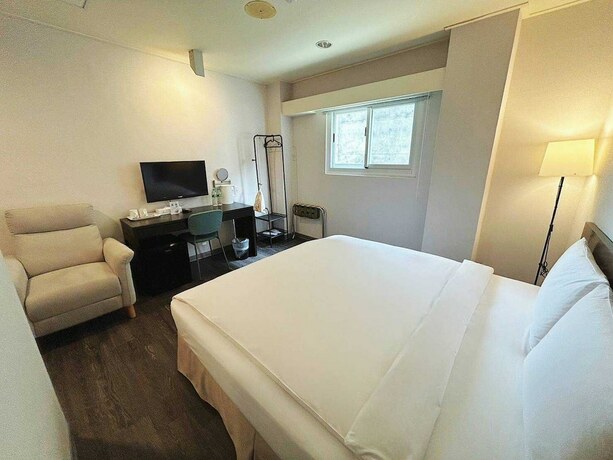 Imagen de la habitación del Hotel Trust. Foto 28