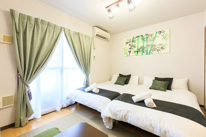 Imagen de la habitación del Hotel Trust Nagoya Apartment. Foto 17