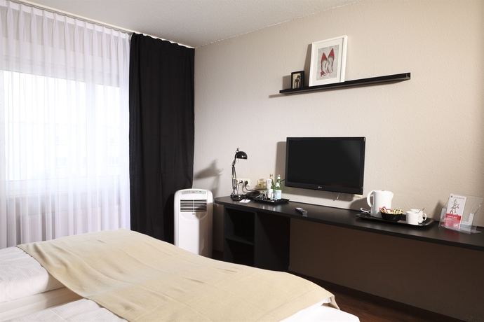 Imagen de la habitación del Hotel Tryp By Wyndham Bremen Airport. Foto 7