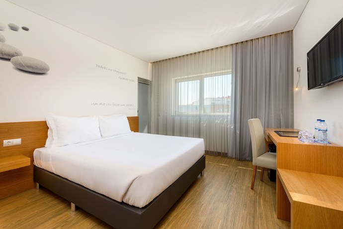 Imagen de la habitación del Hotel Tryp By Wyndham Leiria. Foto 1
