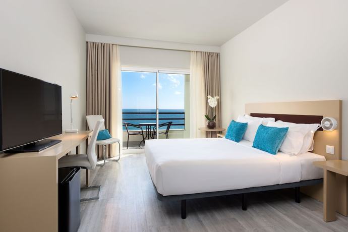 Imagen de la habitación del Hotel Tryp By Wyndham Lisboa Caparica Mar. Foto 1