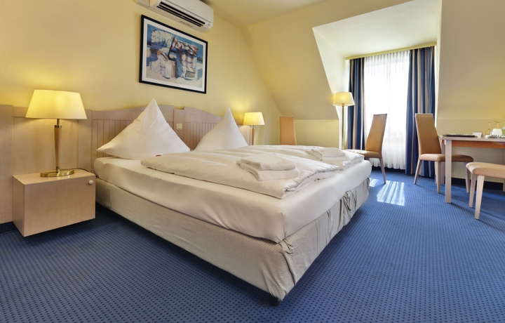 Imagen de la habitación del Hotel Tryp By Wyndham Lübeck Aquamarin. Foto 8