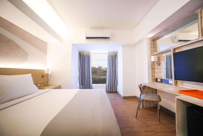 Imagen de la habitación del Hotel Tryp By Wyndham Mall Of Asia Manila. Foto 3