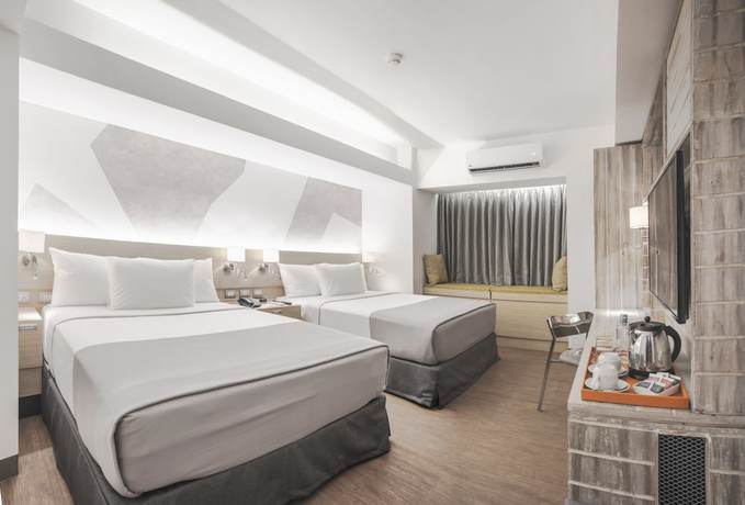 Imagen de la habitación del Hotel Tryp By Wyndham Mall Of Asia Manila. Foto 7