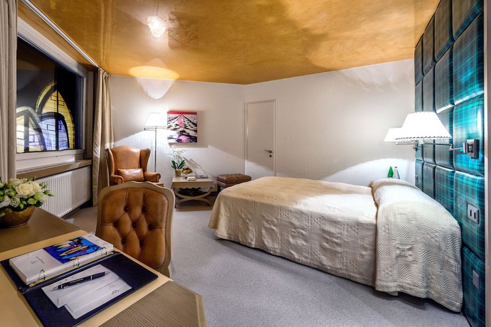 Imagen de la habitación del Hotel Tschuggen Grand Hotel. Foto 12