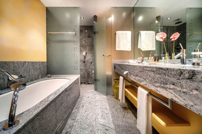 Imagen de la habitación del Hotel Tschuggen Grand Hotel. Foto 18