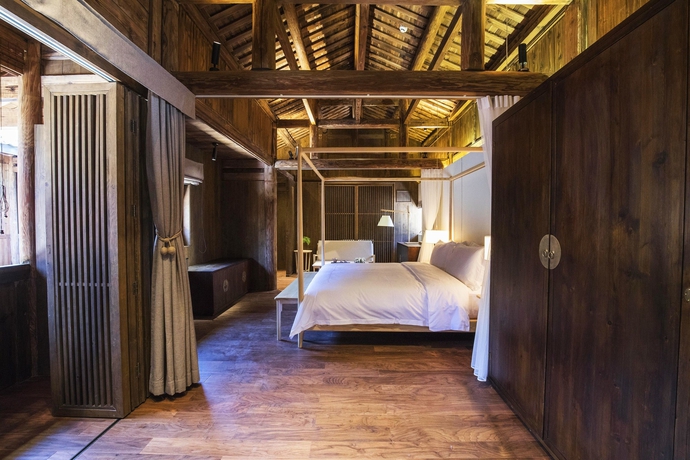 Imagen de la habitación del Hotel Tsingpu Fujian Tulou Retreat. Foto 7