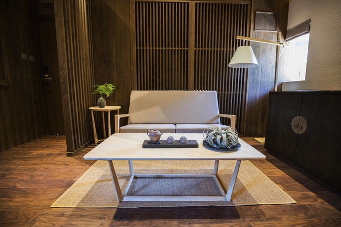 Imagen de la habitación del Hotel Tsingpu Fujian Tulou Retreat. Foto 8