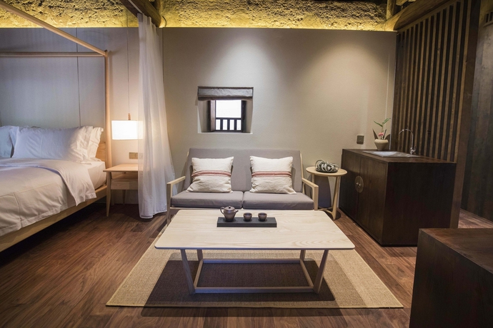 Imagen de la habitación del Hotel Tsingpu Fujian Tulou Retreat. Foto 9