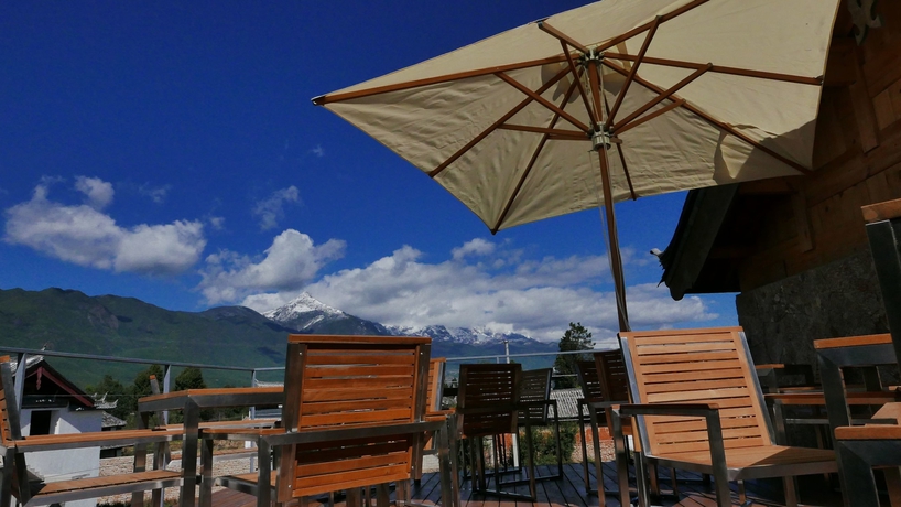 Imagen de los exteriores del Hotel Tsingpu Lijiang Baisha Retreat. Foto 14