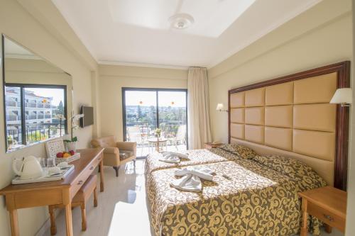 Imagen de la habitación del Hotel Tsokkos Gardens, Protaras . Foto 10