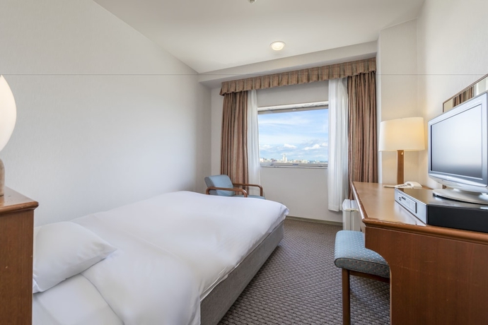 Imagen de la habitación del Hotel Tsu Center Palace. Foto 6