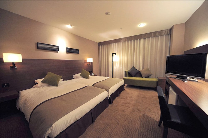 Imagen de la habitación del Hotel Tsu Center Palace. Foto 10