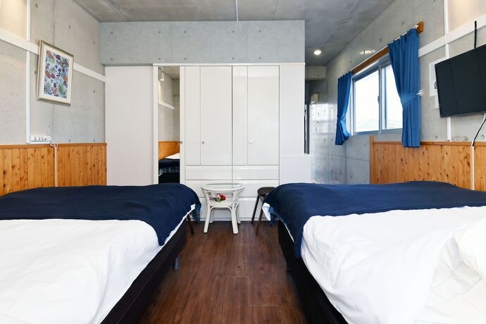 Imagen de la habitación del Hotel Tsukishiro Niraikanai Apatment. Foto 2