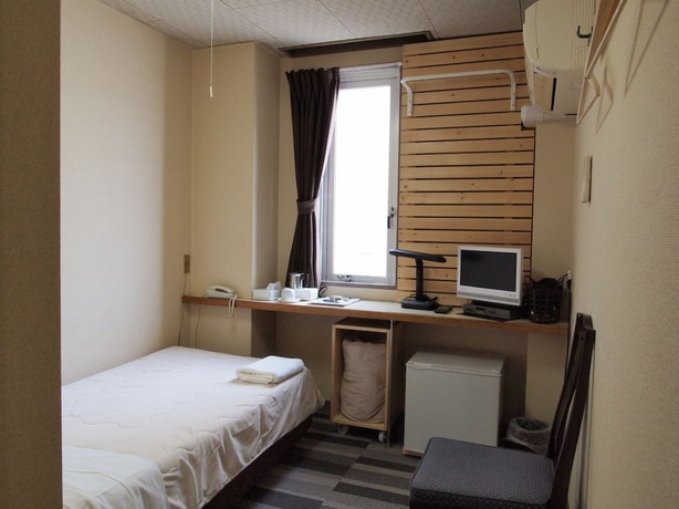 Imagen de la habitación del Hotel Tsukuba Daily-Inn. Foto 11