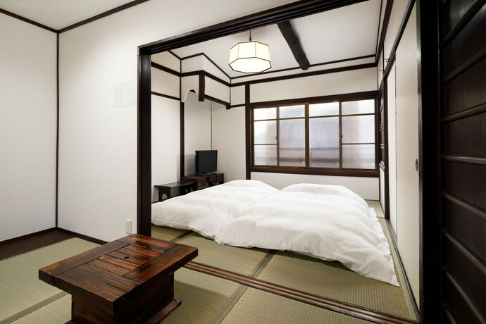 Imagen de la habitación del Hotel Tsumugi Shichijokagiyacho. Foto 30