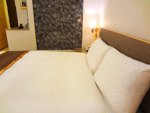 Imagen de la habitación del Hotel Tsun Huang. Foto 6