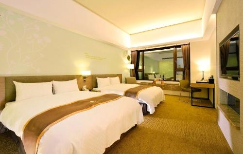 Imagen de la habitación del Hotel Tsun Huang. Foto 8