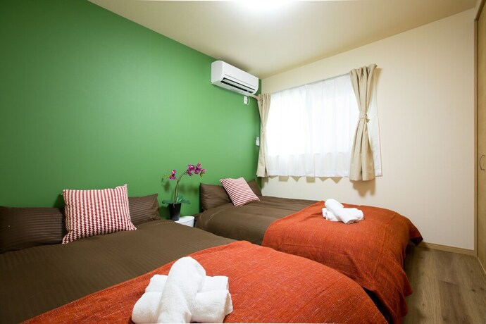 Imagen de la habitación del Hotel Tsuru House. Foto 23