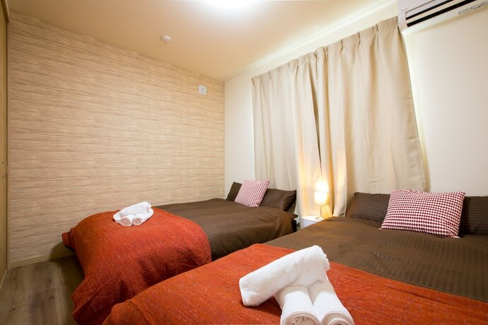 Imagen de la habitación del Hotel Tsuru House. Foto 31