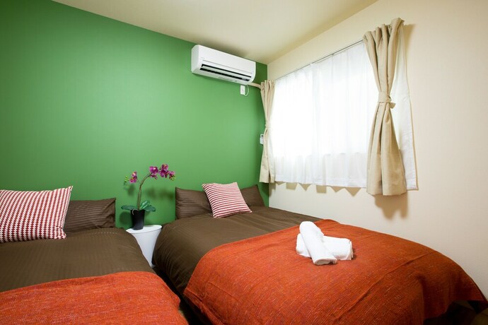 Imagen de la habitación del Hotel Tsuru House. Foto 35