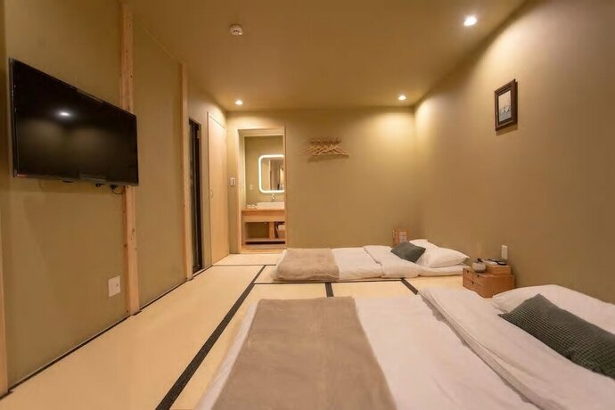 Imagen de la habitación del Hotel Tsuru Inn-tsurumibashi. Foto 24