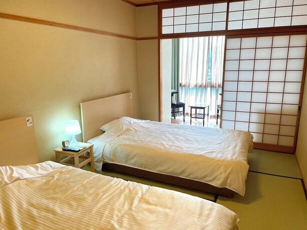 Imagen de la habitación del Hotel Tsutsui. Foto 11