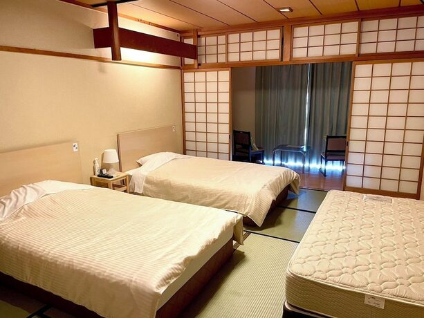 Imagen de la habitación del Hotel Tsutsui. Foto 12