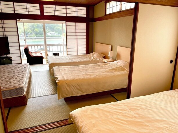 Imagen de la habitación del Hotel Tsutsui. Foto 14