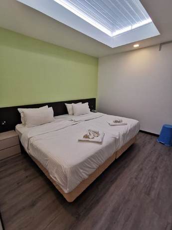 Imagen de la habitación del Hotel Tt Dorf Taiping. Foto 4