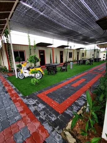 Imagen de los exteriores del Hotel Tt Dorf Taiping. Foto 14
