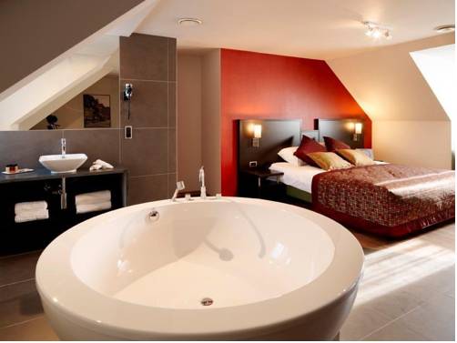 Imagen de la habitación del Hotel Tts. Foto 9