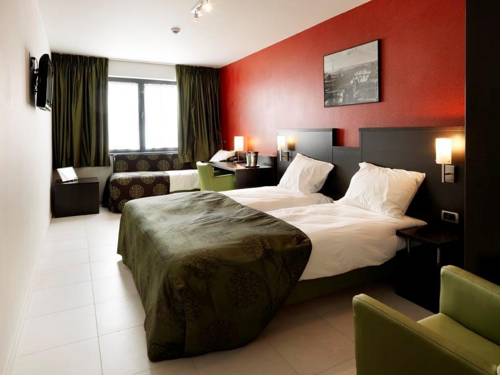 Imagen de la habitación del Hotel Tts. Foto 10