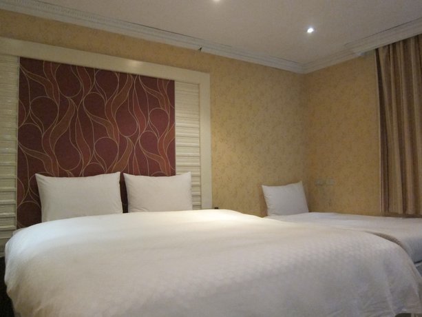 Imagen de la habitación del Hotel Tu Cheng Hotel. Foto 2