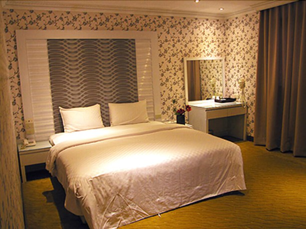 Imagen de la habitación del Hotel Tu Cheng Hotel. Foto 7