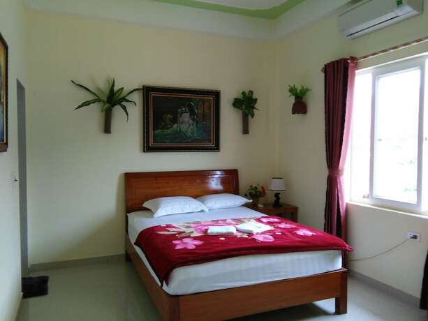 Imagen de la habitación del Hotel Tu Lan Homestay. Foto 7