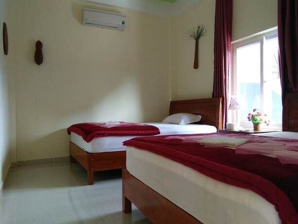 Imagen de la habitación del Hotel Tu Lan Homestay. Foto 9