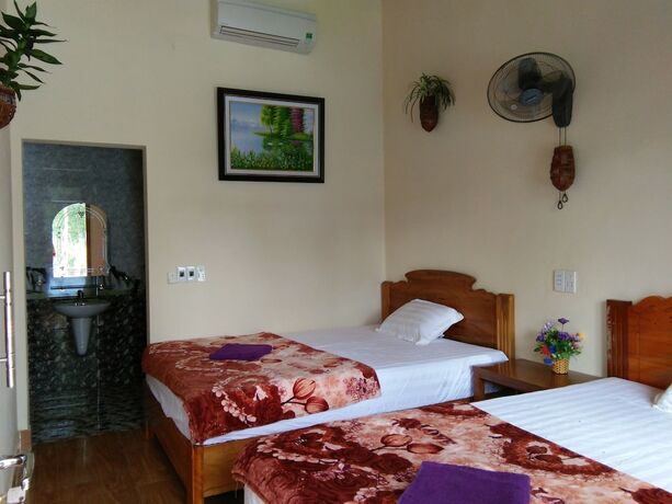 Imagen de la habitación del Hotel Tu Lan Homestay. Foto 10