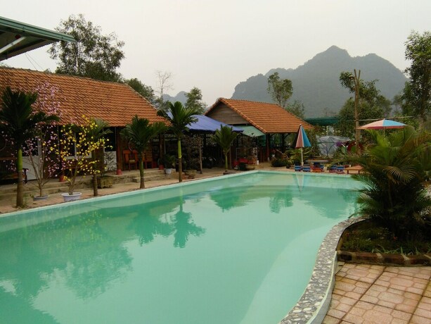 Imagen de la piscina del Hotel Tu Lan Homestay. Foto 17