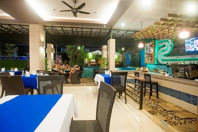 Imagen del bar/restaurante del Hotel Tuana Blue Sky Patong. Foto 1