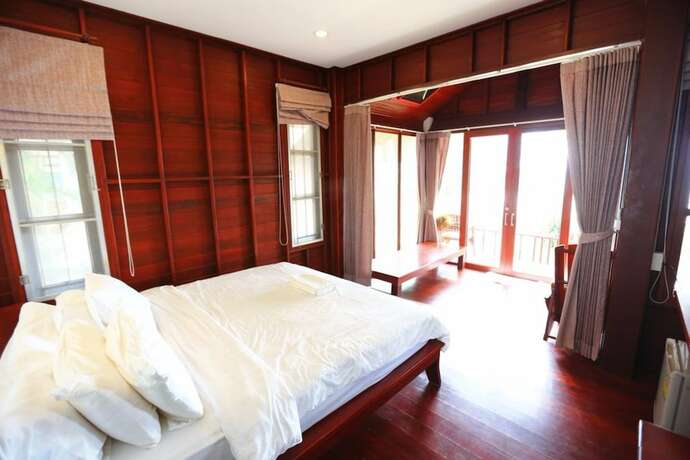 Imagen de la habitación del Hotel Tubtim Resort. Foto 11