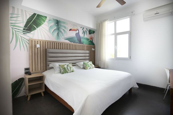 Imagen de la habitación del Hotel Tucan Suites Aparthotel. Foto 14