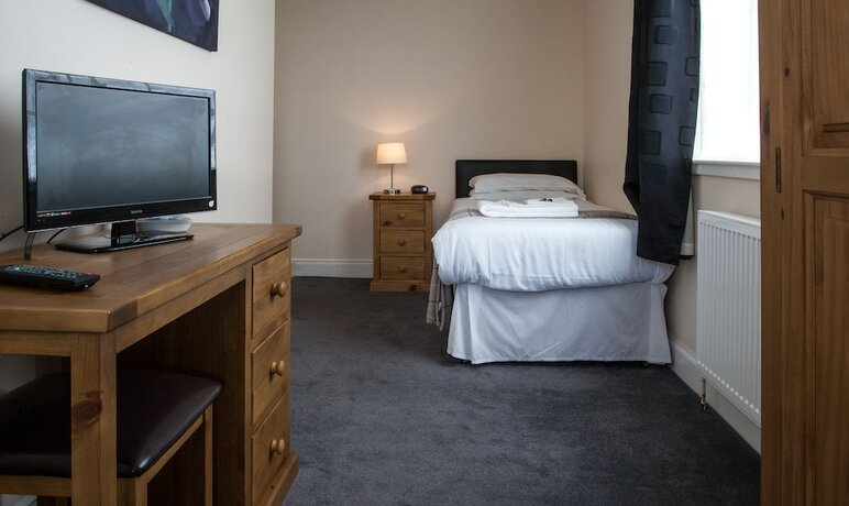 Imagen de la habitación del Hotel Tuckers Inn. Foto 14