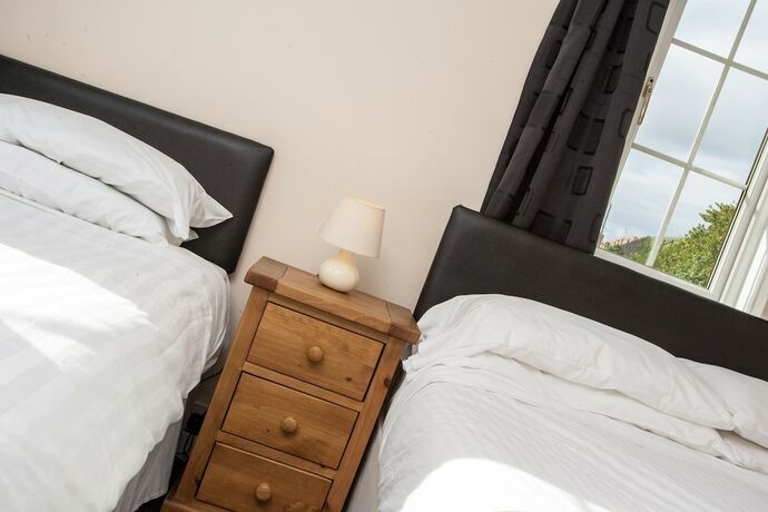 Imagen de la habitación del Hotel Tuckers Inn. Foto 15