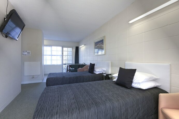 Imagen de la habitación del Hotel Tudor Motor Lodge. Foto 18