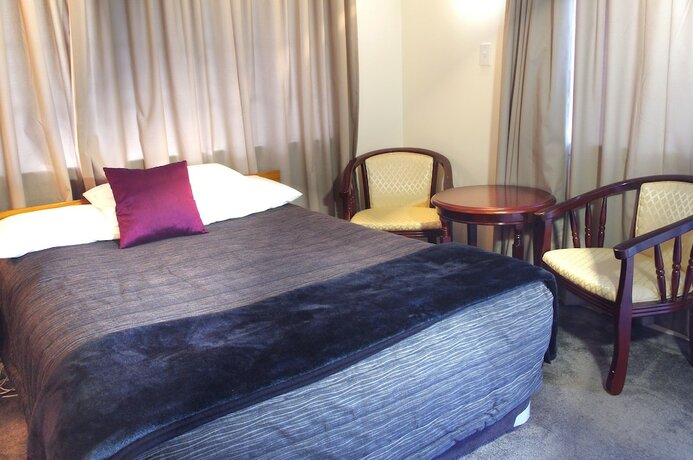 Imagen de la habitación del Hotel Tudor Motor Lodge. Foto 20
