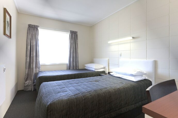 Imagen de la habitación del Hotel Tudor Motor Lodge. Foto 22