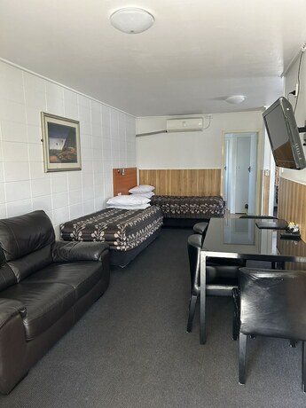 Imagen de la habitación del Hotel Tudor Motor Lodge. Foto 23